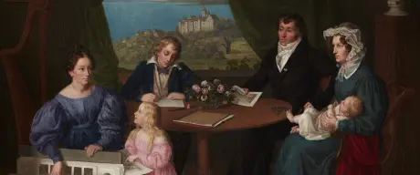 Das Gemälde zeigt eine Familie am Tisch sitzend